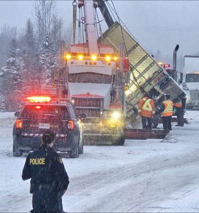 Heavy-recovery tow truck working a winter recovery